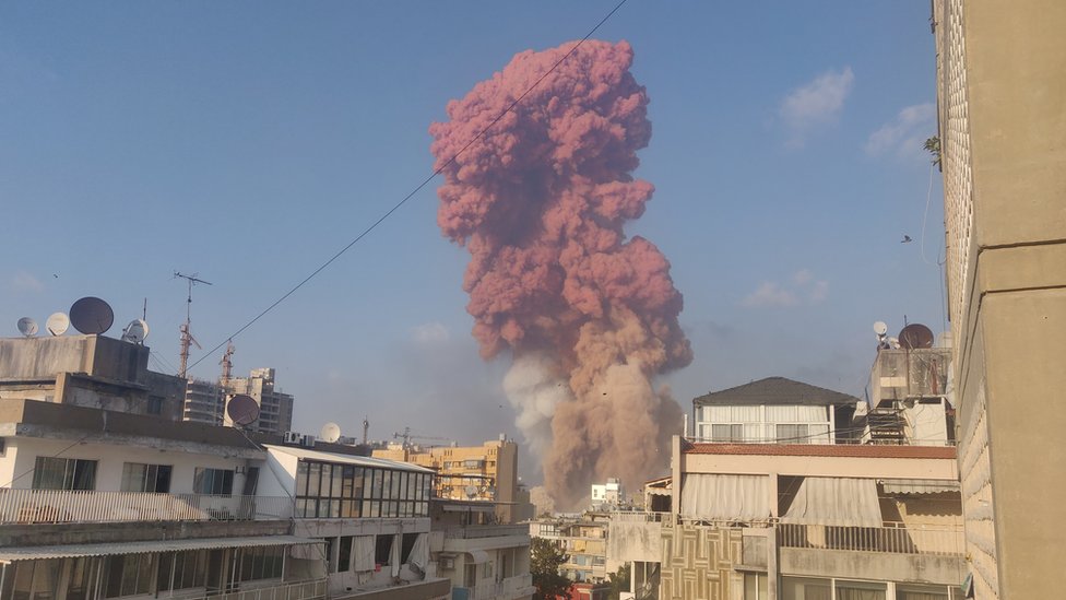 A red cloud of smoke is seen after the explosion in Beirut
