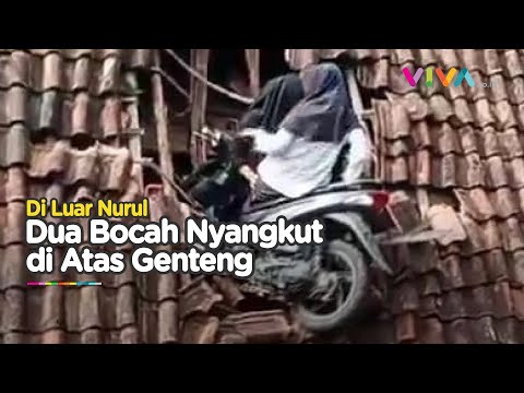 Terlalu Gaspol! Dua Ukhti Nyangkut di Genteng Saat Ngabuburit