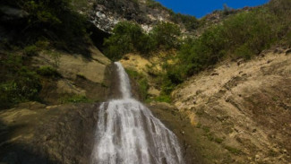 Pesona Curug Pelangi yang Tersembunyi