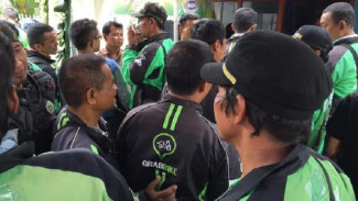 Survei: Gojek Ungguli Grab