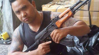 Pamer Foto di Facebook dengan AK-47, Pria Bali Diciduk