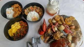 Sensasi Makan Seafood Berlumur Saus Asia