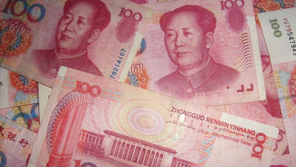 Yuan vs Dolar AS, Mana yang Lebih Menguntungkan untuk Investasi di 2026?