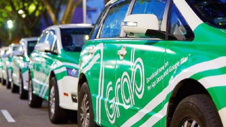 Pemerintah Bikin Aturan yang Wajibkan GrabCar Pasang Lampu Taksi