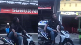 Anti Mainstream, Aksi Pengendara Motor Duduk Bersila di Atas Motor Bikin Warganet Geleng Kepala